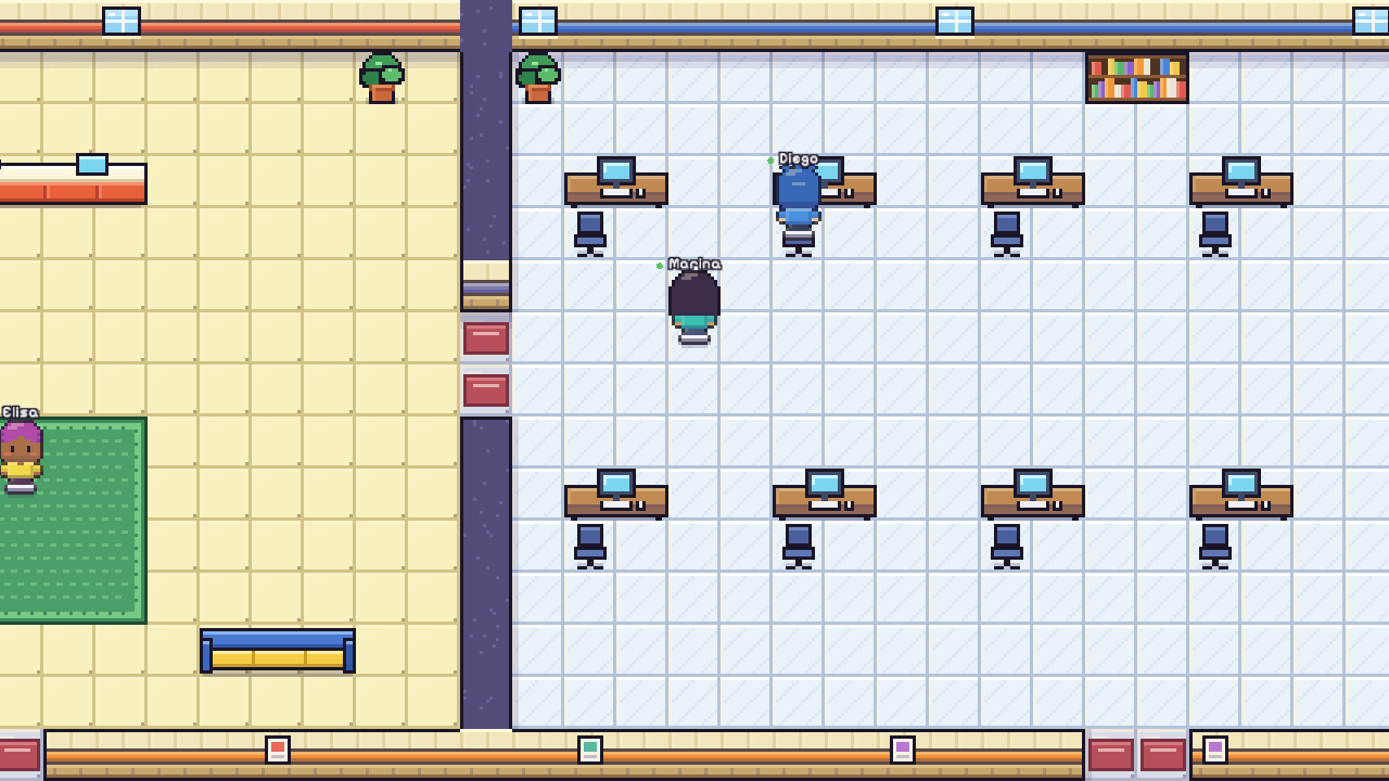 In-game screenshot of the desk area with computers and chairs